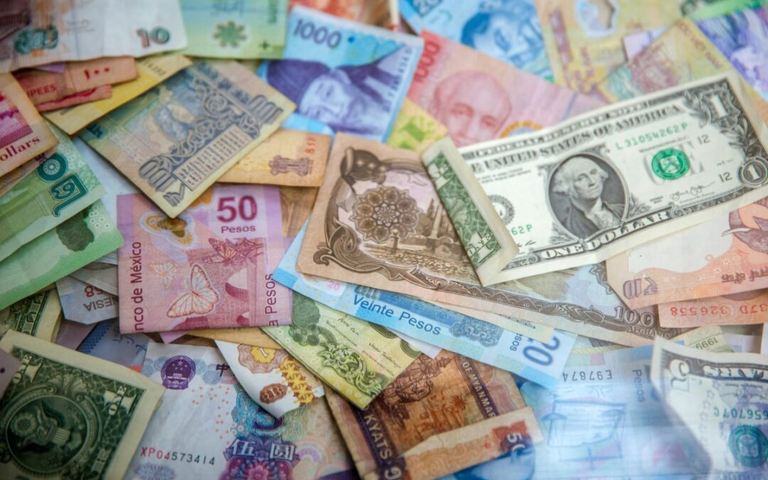 City Breaks Explorer - 10 Tips for Cheap Travel - World Currency Bank Notes